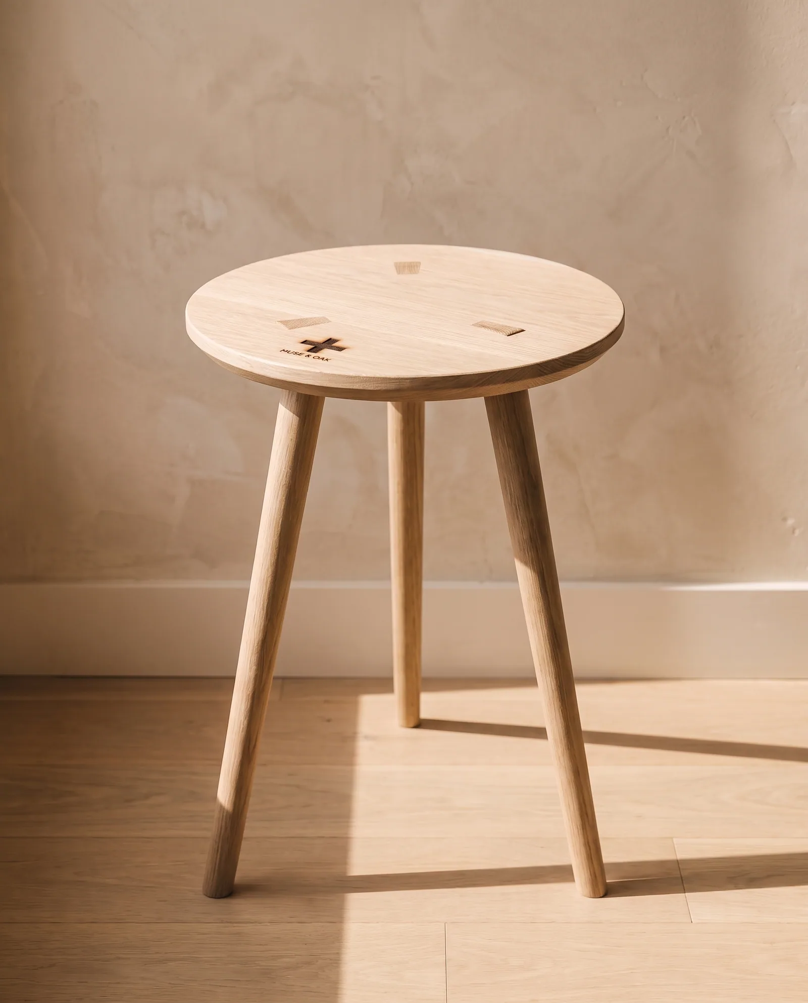 Round Side Table — Solid top, three-leg splay.